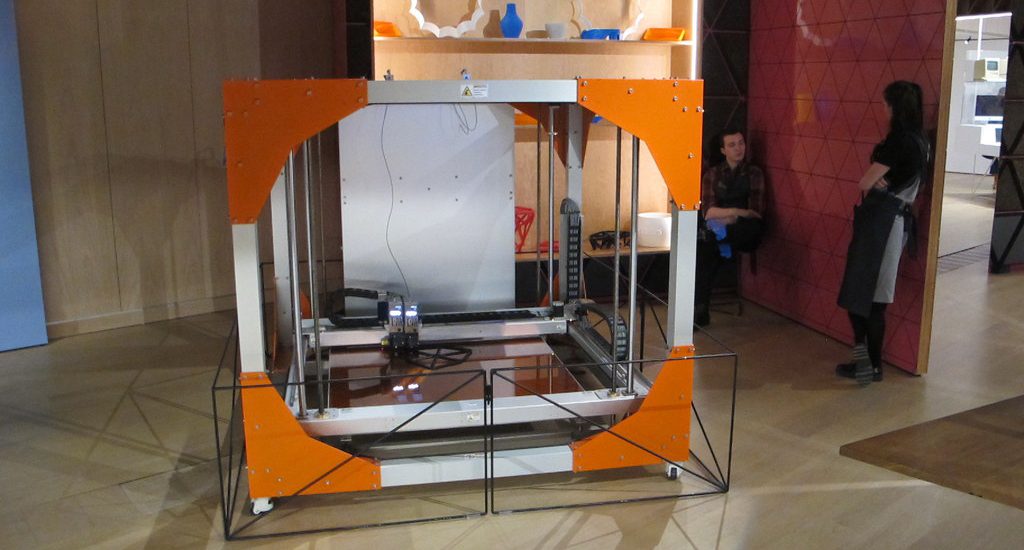 This industrial 3D printer can print out furniture. It's the future of 3D printing and manufacturing. It's amazing what 3D printing can do to a company's inventory costs.