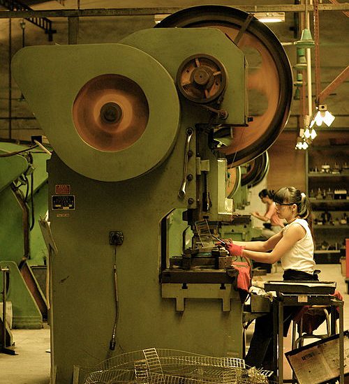 Chinese punch press. This is the kind of machine automation could replace, but make sure you will get a positive ROI.