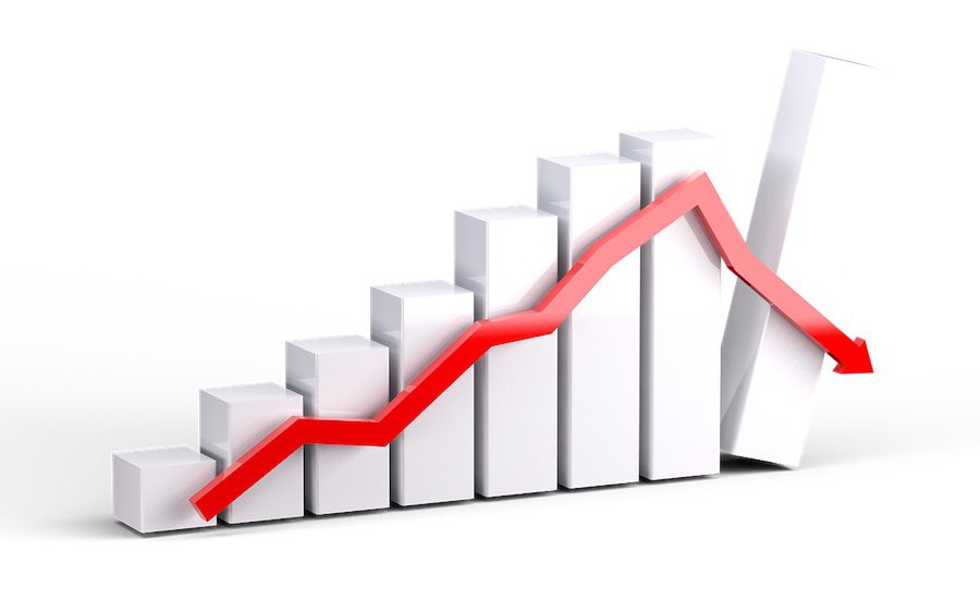 3D graphic representing a recession bar graph and line graph.