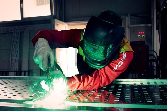 Photo of a person welding